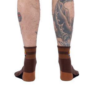 Rear view of the socks on a model's legs.