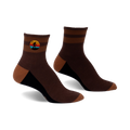 Pair of brown and tan striped ankle socks with a small embroidered Bigfoot in a retro sunset design.