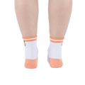 Rear view of the socks on a person's feet against a white background.