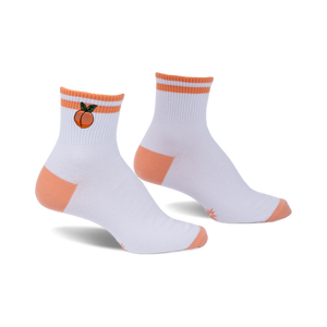 Pair of white ankle socks with peach embroidery, orange stripes, and orange heel and toe details. 