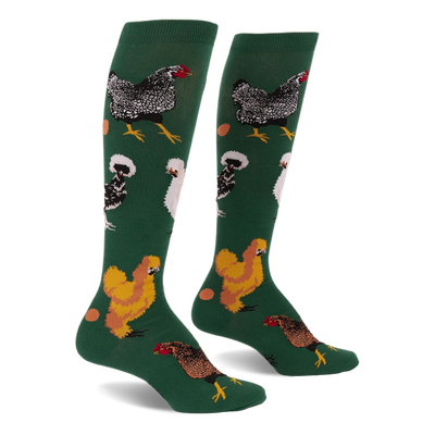 Pair of knee-high dark green socks featuring various types of chickens- mottled black, fluffy white, golden brown- with scattered eggs.