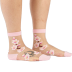 Sheer ankle socks with delicate embroidered pink cherry blossoms, pink cuffs, reinforced heels, and toes.