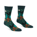 Pair of dark green crew socks with a repeating pattern of Bigfoot, Mothman, alien, Yeti, campfire, trees, moon, and stars.