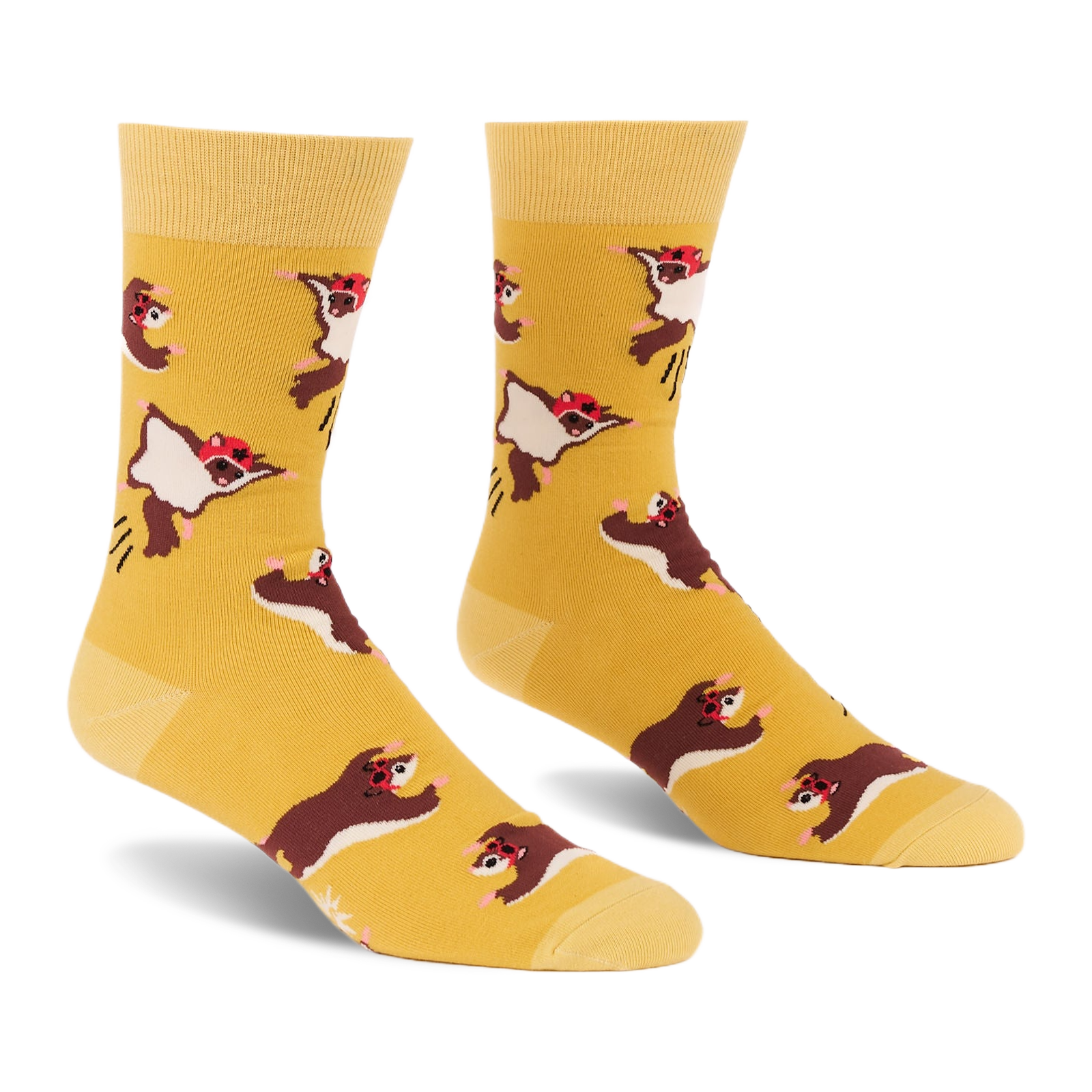 Pair of crew socks in mustard yellow with an all-over pattern of brown and white flying squirrels wearing red caps, shown against a white background.