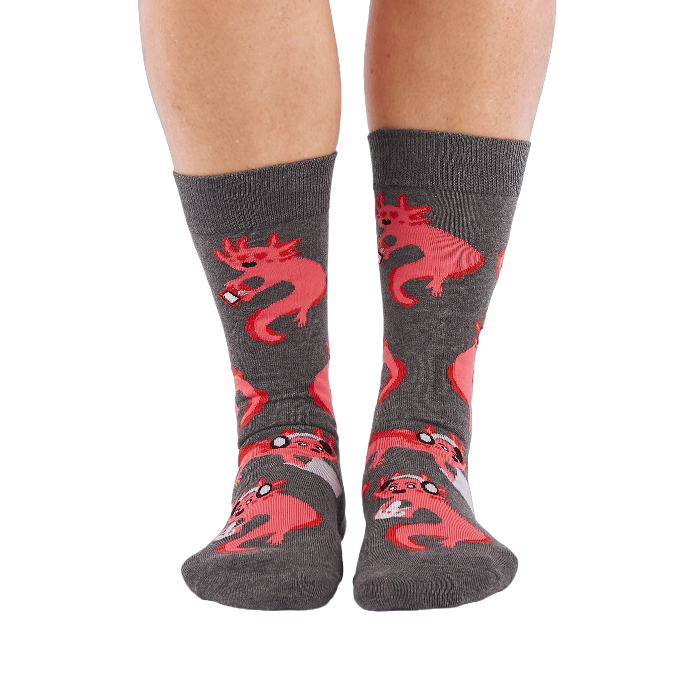 Full-length shot of a person's legs, viewed from the front, wearing grey axolotl gaming crew socks on a white background.