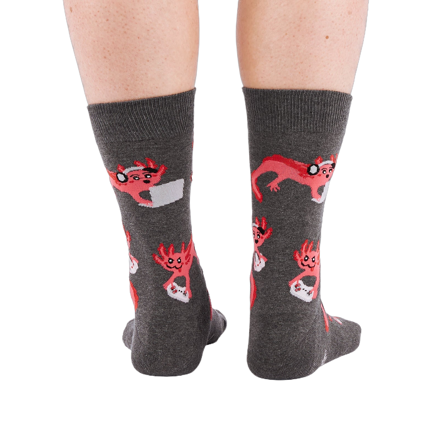 Full-length shot of a person's legs, viewed from the back, wearing grey axolotl gaming crew socks on a white background.