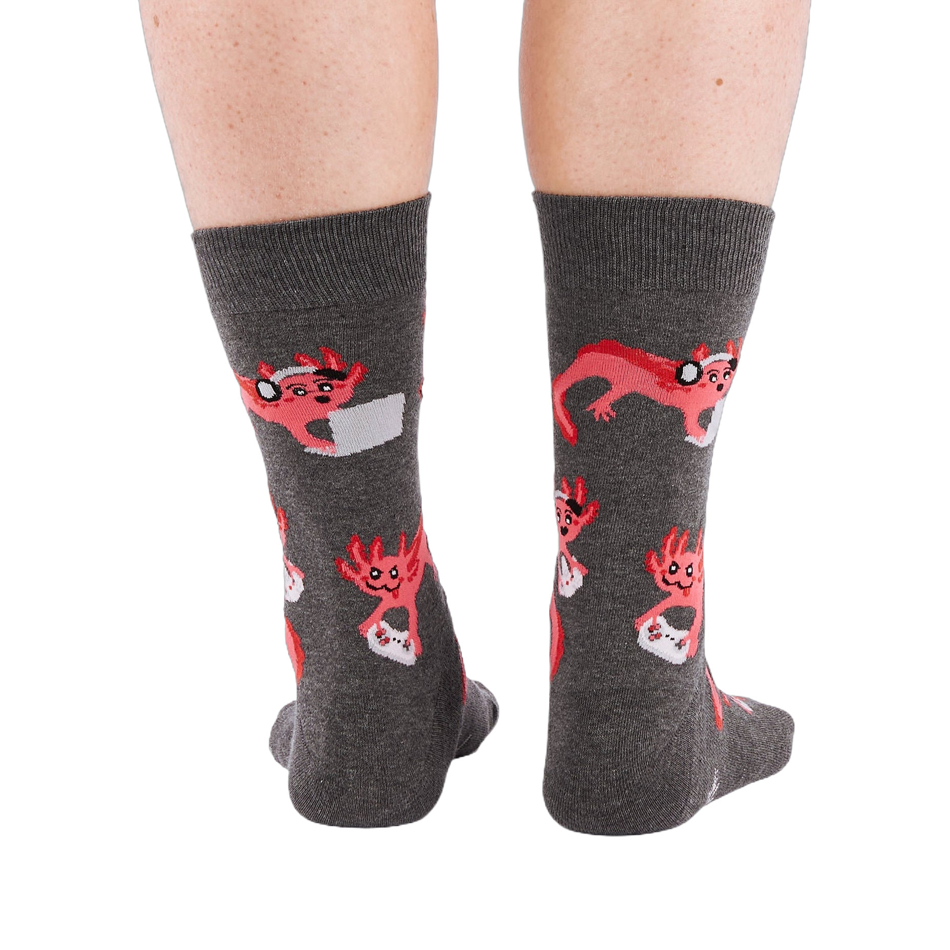 Full-length shot of a person's legs, viewed from the back, wearing grey axolotl gaming crew socks on a white background.