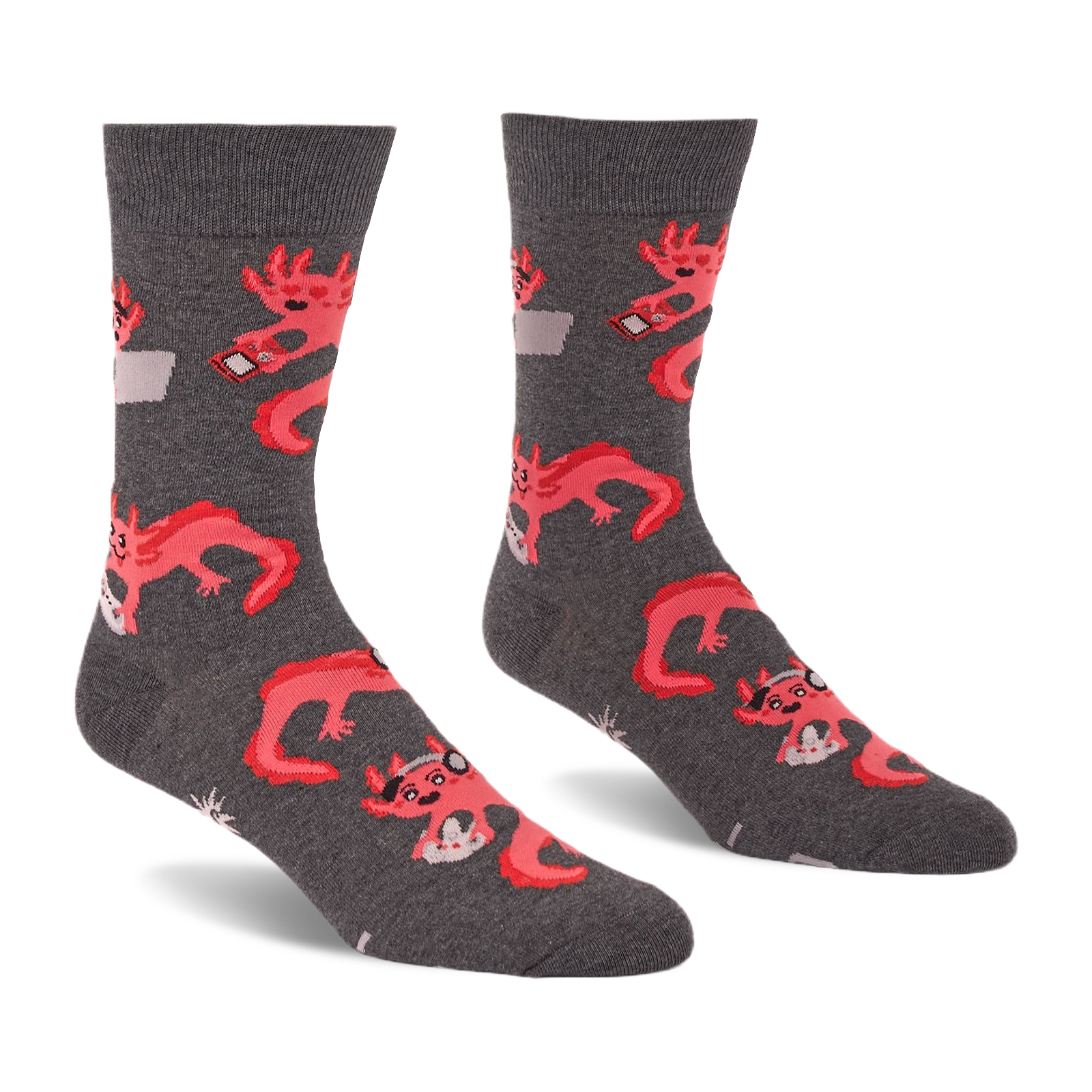 Pair of grey crew socks with a repeating pattern of coral pink axolotls holding game controllers and smartphones.