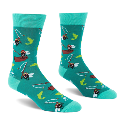 Pair of teal crew socks showing cartoon flies fly fishing from canoes with green and yellow fish leaping.