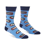 Pair of light blue crew socks with a repeating pattern of fish on brown rectangular shapes and white knot designs.