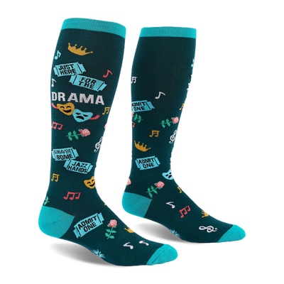 Dark teal knee-high socks with bright turquoise accents, featuring theater masks, roses, tickets, and drama text.