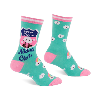 Pair of teal crew socks with pink toes, heels, and striped cuffs. Features a cloud in hiking boots, smiling white clouds, and rainbows.