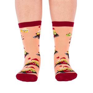 Person wearing peach 