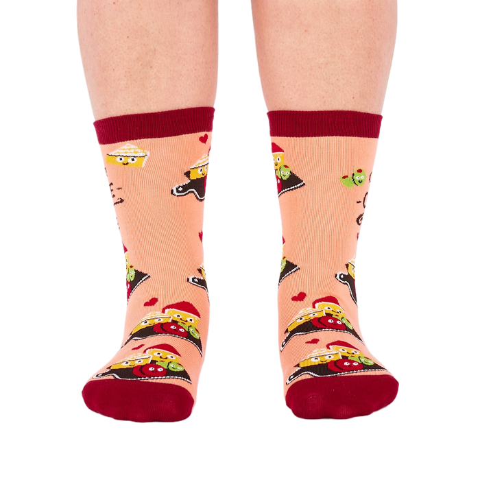 Person wearing peach 