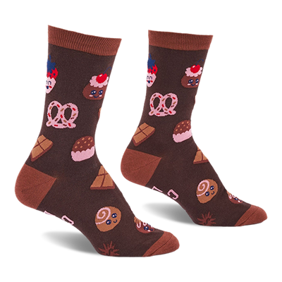 Pair of brown crew socks with light brown cuffs, heels, and toes, covered in a pattern of cupcakes, pretzels, and chocolate.