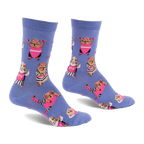 Pair of periwinkle blue crew socks with a pattern of guinea pigs in pink workout gear and headbands, lifting small weights.