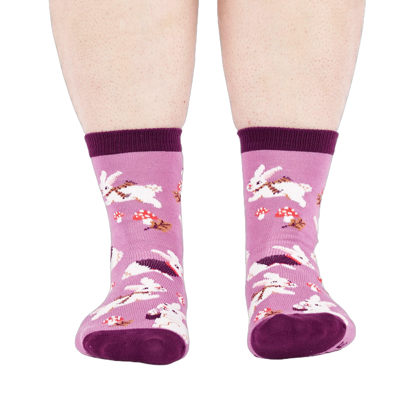 Person wearing the lavender 'Snuggle Bunny' crew socks, viewed from the front, showing leg and foot.