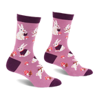 Pair of crew socks in soft lavender with white bunnies, some in dark purple vests, red mushrooms, and dark purple accents.