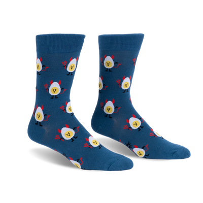 Dark blue crew socks with a repeating pattern of deviled eggs featuring yellow faces, red devil horns, tails and pitchforks.
