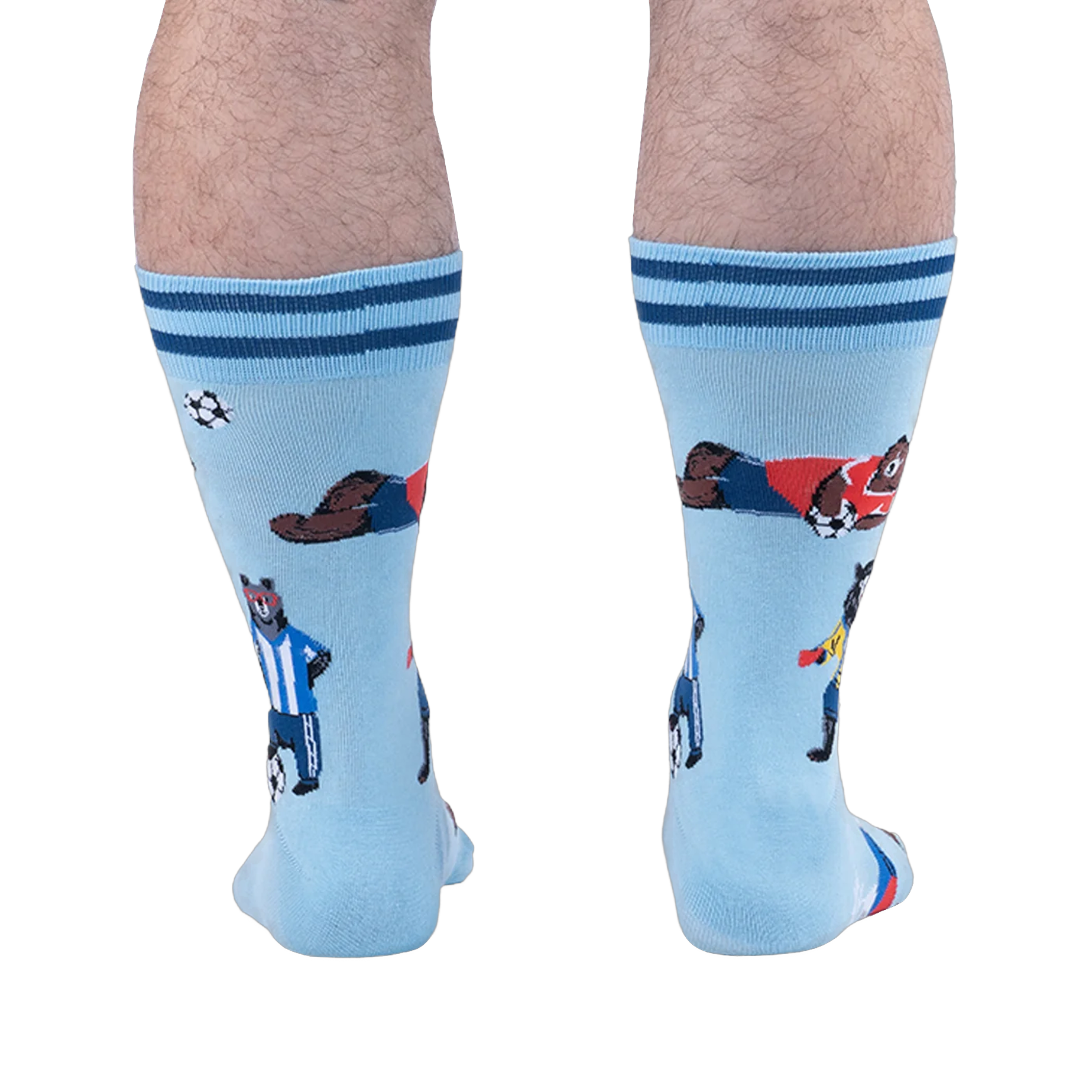 Back view of the socks worn on legs, highlighting a bear in a blue and white striped jersey standing with a soccer ball.