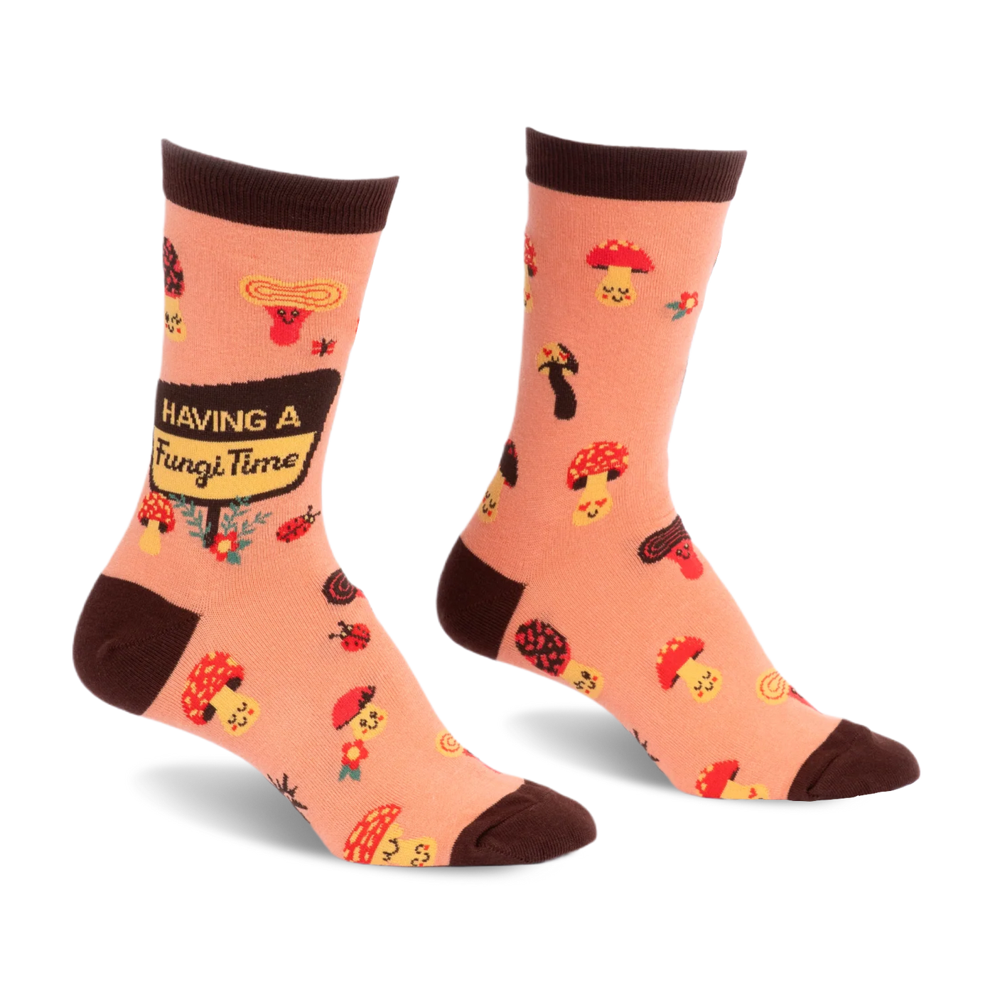 Peach socks with brown trim, featuring cute smiling mushrooms, ladybugs, and a sign reading Having a Fungi Time.