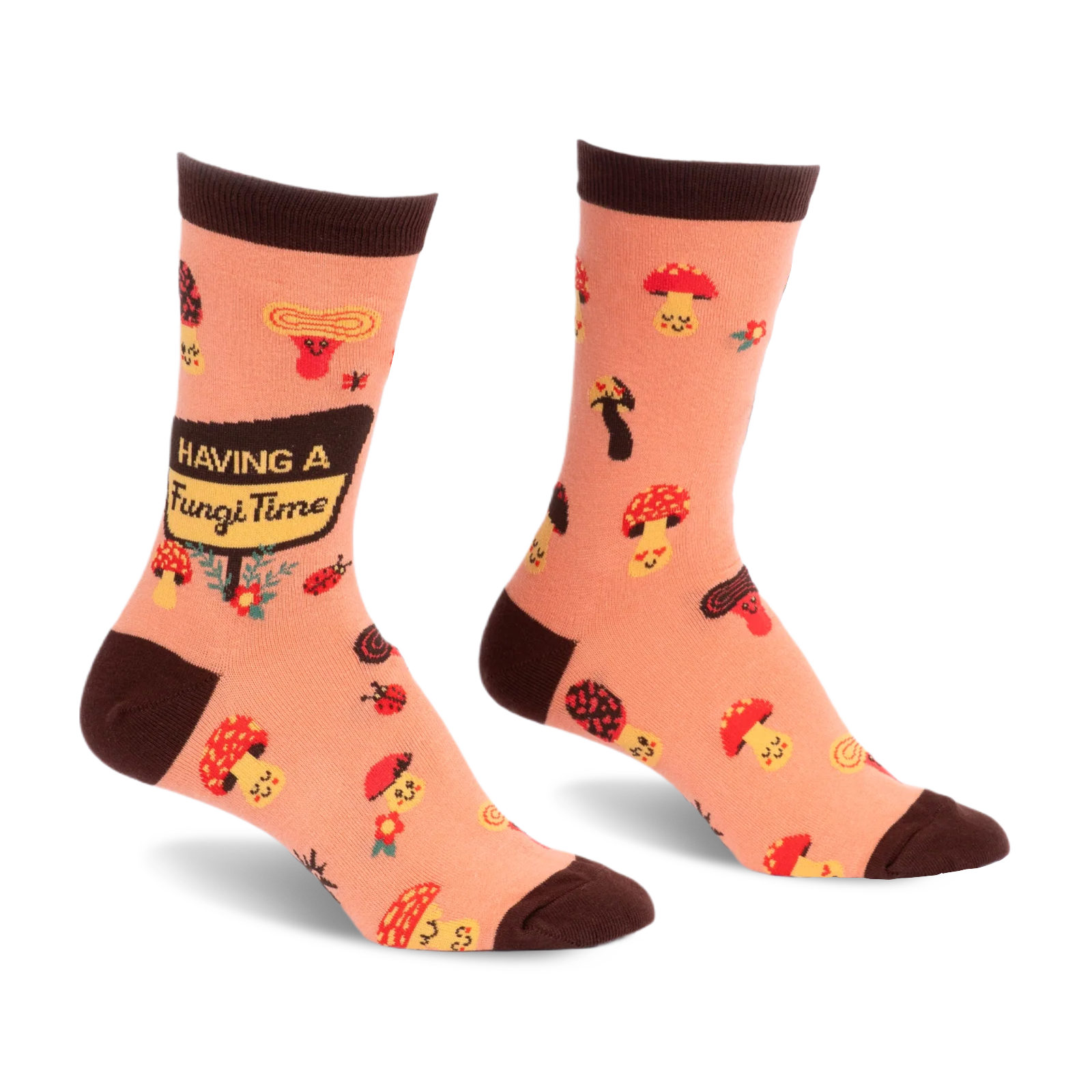 Peach socks with brown trim, featuring cute smiling mushrooms, ladybugs, and a sign reading Having a Fungi Time.