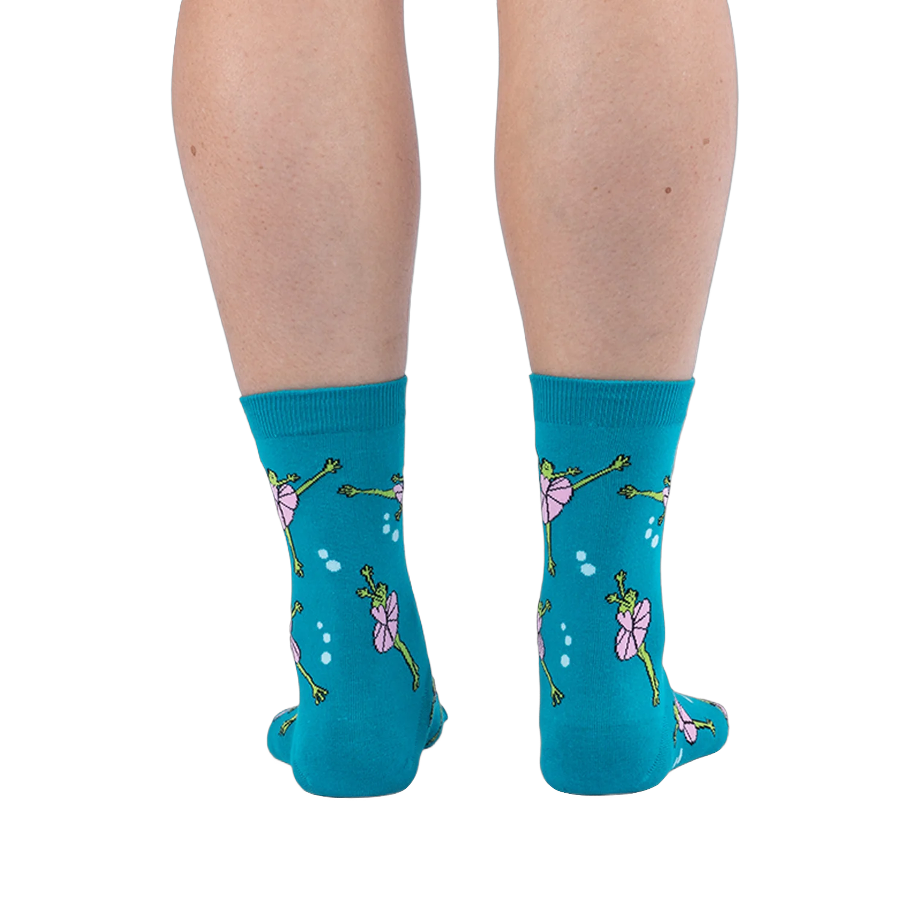 Back view of a person's calves wearing the teal ballet frog socks, showing the green frog and pink tutu design from behind.