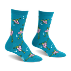Teal crew socks featuring a pattern of green frogs wearing pink tutus and dancing in ballet poses surrounded by white dots.