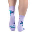 Back view of socks on legs, showing a teal octopus pattern and the words SOCK TOPUS printed on the sole in teal.