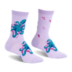 Pair of light purple crew socks featuring a pattern of teal octopuses wearing tiny pink and white striped socks.