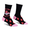 Black crew socks with pink heel and toe. Features Slow Burn Book Club text, a pink book, lit match, and flaming red hearts.