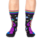 Front view of someone wearing black wizard socks, showing the wizard's purple hat, staff, and striped cuffs on both legs.