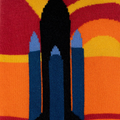Macro shot of knitted sock fabric detailing the blue and black space shuttle silhouette against a warm striped background.