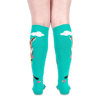 Back view of the worn teal socks displaying fluffy white clouds and the side profile of the kangaroo design.