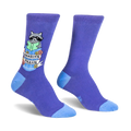 Purple crew socks featuring a raccoon reading a green book inside a trash can with a Reading Trash banner and floral details.