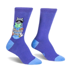 Purple crew socks featuring a raccoon reading a green book inside a trash can with a Reading Trash banner and floral details.