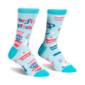 Light blue crew socks with teal trim featuring retro patterned mixing bowls, baking tools, and Thrifty B*tch text.