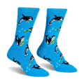 Bright blue crew socks displaying a pattern of black and white orcas playing yellow saxophones and trumpets with music notes.
