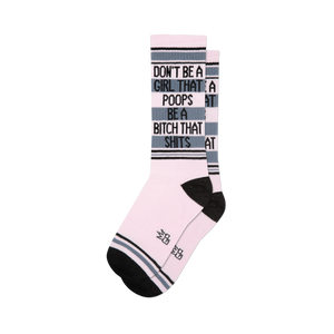 Pink crew socks with black and grey stripes, featuring text 'Don't Be A Girl That Poops Be A Bitch That Shits' on cuff.