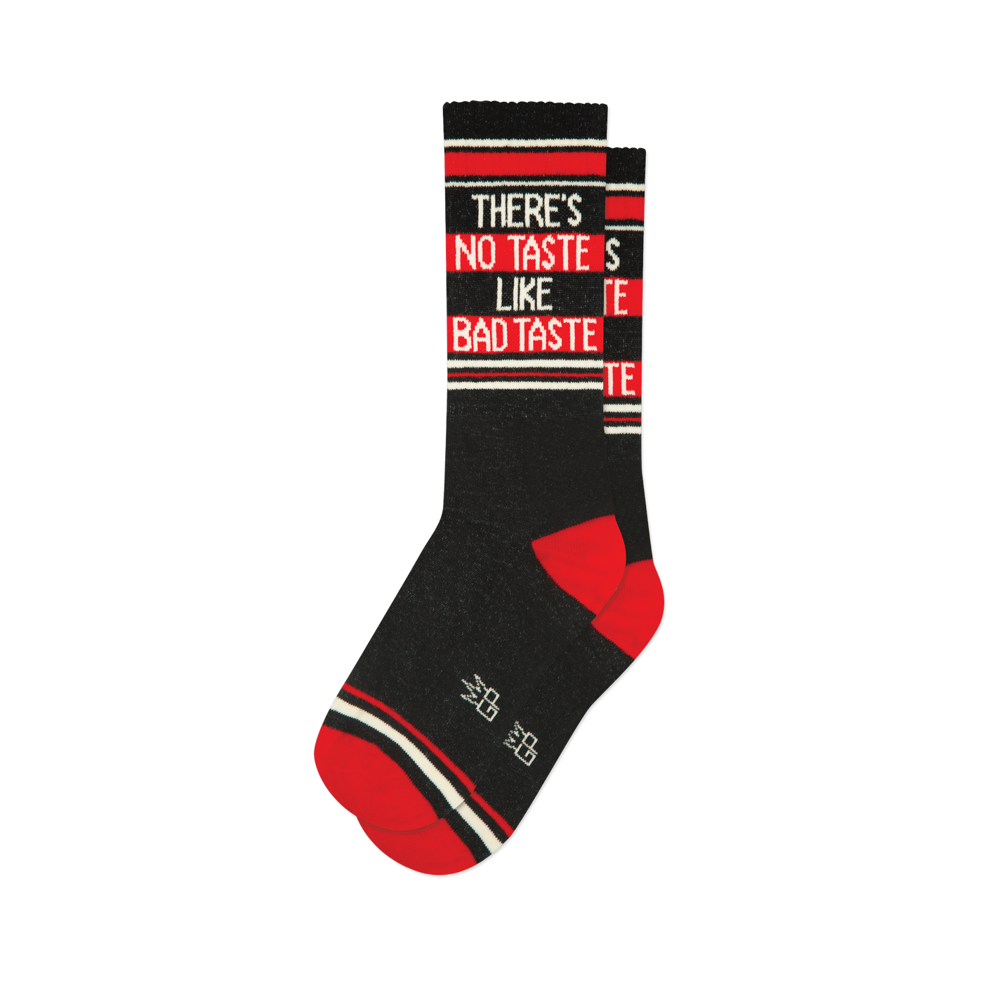 Single dark grey crew sock with "THERE'S NO TASTE LIKE BAD TASTE" text, red heel, red toe, and white/red stripes.