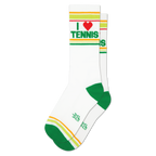 Pair of white crew socks with green and yellow-orange cuff stripes. Features 'I ❤️ TENNIS' text with a red heart. Green heels and toes.
