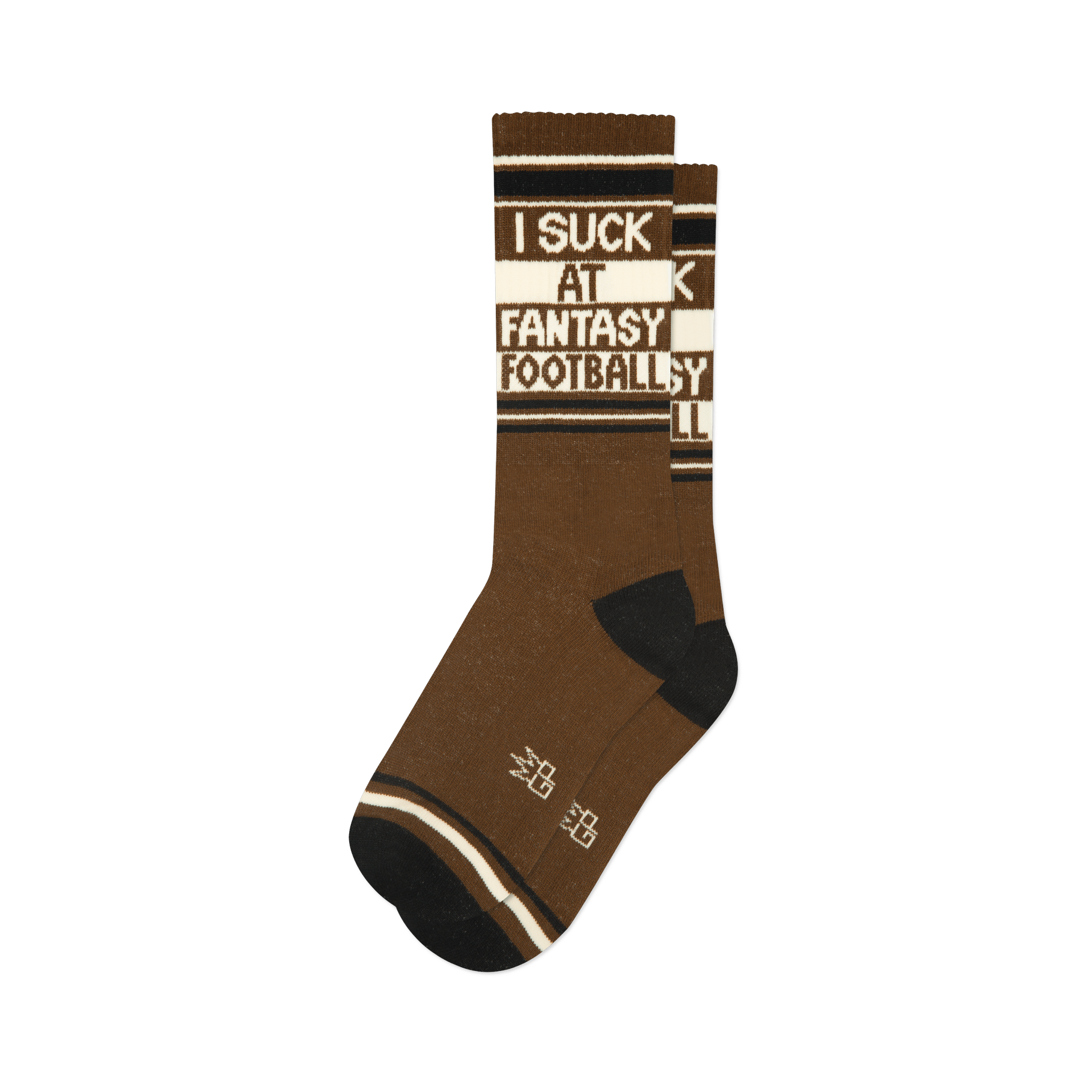 A single brown crew sock with black toes and heels. Features "I SUCK AT FANTASY FOOTBALL" text on a white band.