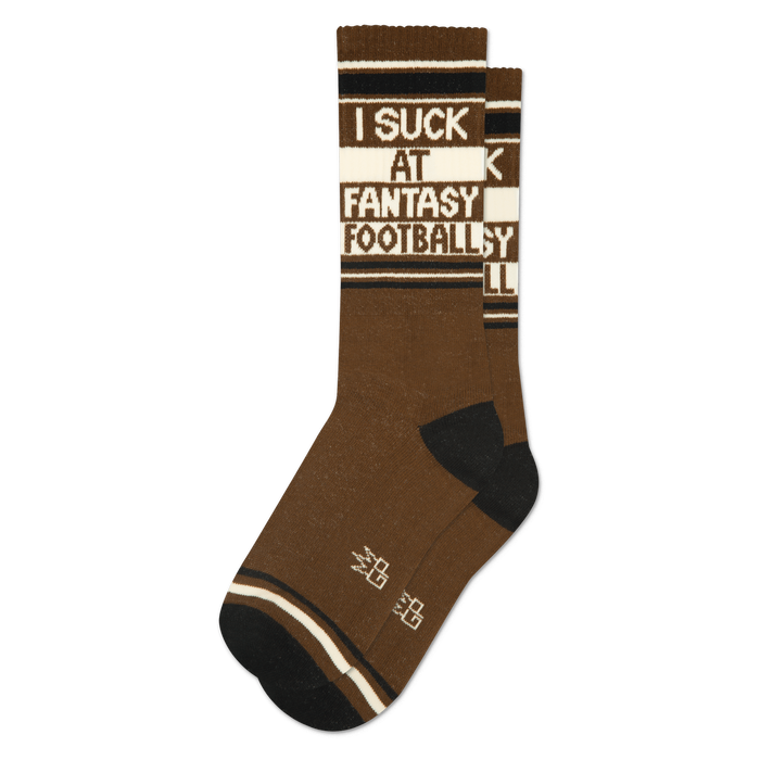 A single brown crew sock with black toes and heels. Features 