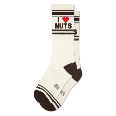 Pair of cream crew socks with dark brown cuffs, heels, and toes. Features 'I ❤️ NUTS' in black text with a red heart.