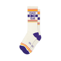 Coach of the Year cream crew socks with purple text, heel, and toe, featuring bold orange and yellow stripes on the cuff.