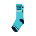 Pair of turquoise crew socks with navy blue 'BOY MOM' text, navy heels/toes, and navy and cream stripes.
