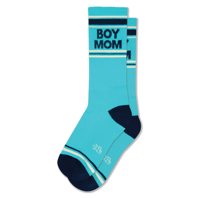 Pair of turquoise crew socks with navy blue 'BOY MOM' text, navy heels/toes, and navy and cream stripes. }}
