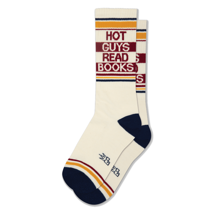 Cream crew socks with 'Hot Guys Read Books' text in red, yellow, and navy stripes, dark blue toe and heel. }}