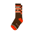 Brown crew socks with orange heel and toe. Bold white and orange text reads EASILY DISTRACTED BY DOGS between thin stripes.