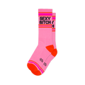 Light pink crew socks with SEXY BITCH in black text, framed by hot pink and orange stripes with bright orange toe and heel.
